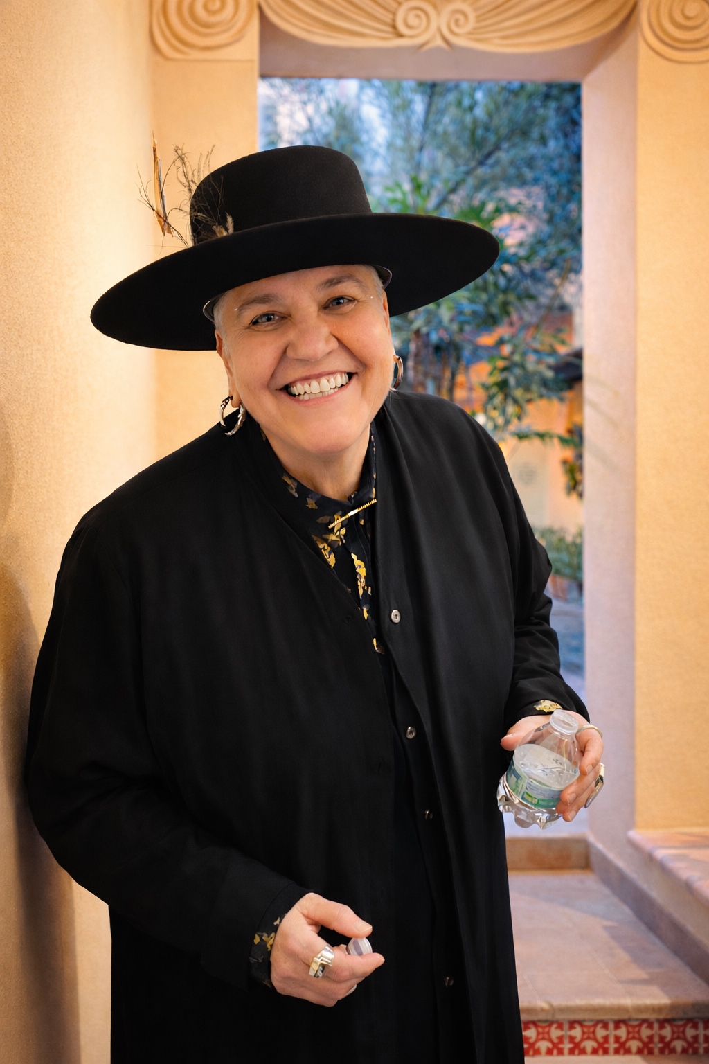 Lady Zen smiling in black hat